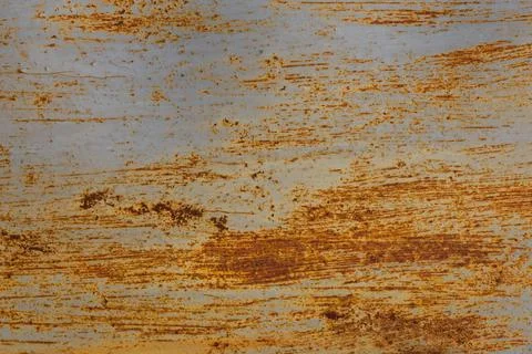 Rusted flat solid sheet metal surface background and texture with leftovers of Stock Photos
