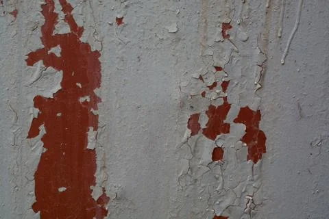 Rusted grey paint on the side of the wall Stock Photos