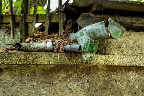 Rusted gutter in disrepair. Fotos de archivo