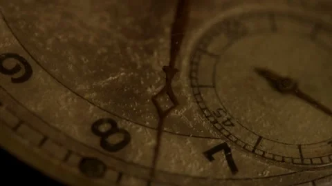 Rusted hands tick over a dusty antique watch face Stock Footage 329595873