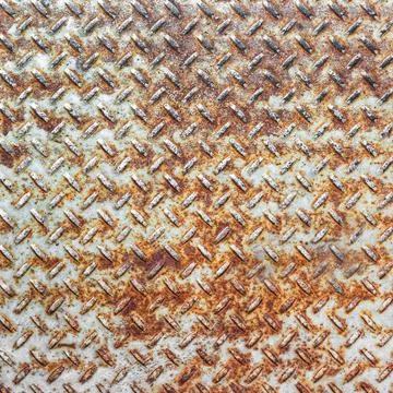 Rusted metal with diamond pattern Background of old metal diamond plate in... Stock Photos