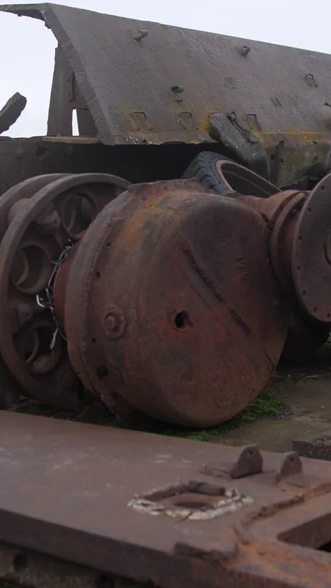 Rusted tank interior with winch drums, spool and scattered components on Stock Footage 321372703