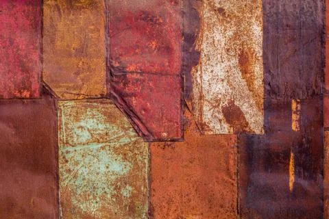 Rusted tin sheets patchwork wall texture and flat background 스톡 사진