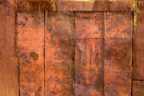 Rusted tin sheets patchwork wall texture and flat background Stockfoto's