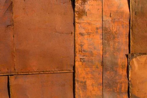 Rusted tin sheets patchwork wall texture and flat background 库存照片