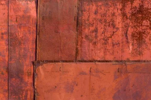 Rusted tin sheets patchwork wall texture and flat background Stockfoto's