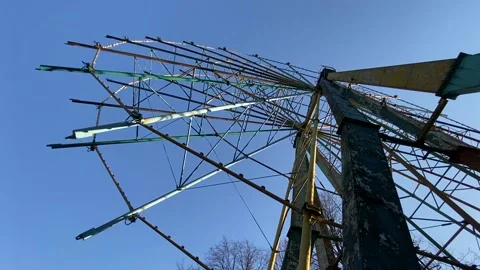 Rustic abandoned Ferris wheel Stock Footage 152138181