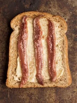 Rustic anchovy toast Stock Photos