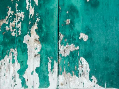 Rustic and weathered turquoise colored paint on wood panel Foto stock