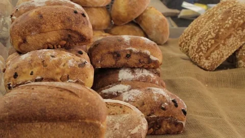 Rustic Artisan Bread Loaves on Display at Outdoor Market Stall in Sydney Stock Footage 345711471