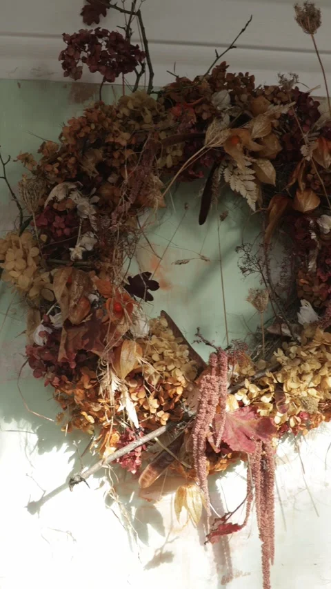 Rustic Autumn Wreath with Dried Flowers and Natural Botanicals, Vertical Video Stock Footage 346640035