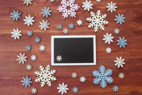 Rustic background with snow flakes Stock Photos