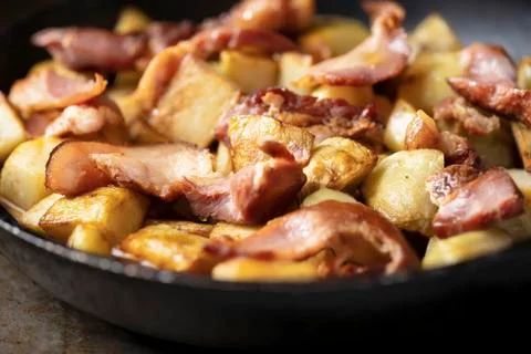 Rustic bacon potato hash breakfast Stock Photos