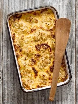 Rustic baked cauliflower cheese Stock Photos