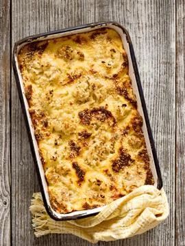 Rustic baked cauliflower cheese Stock Photos