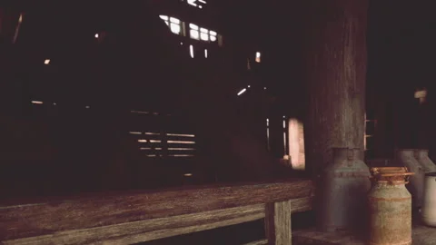 Rustic Barn Filled With Vintage Jars and Soft Golden Light Shining Through Stock Footage 344542261