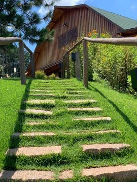 Rustic Barn with Stone Path Stock Photos