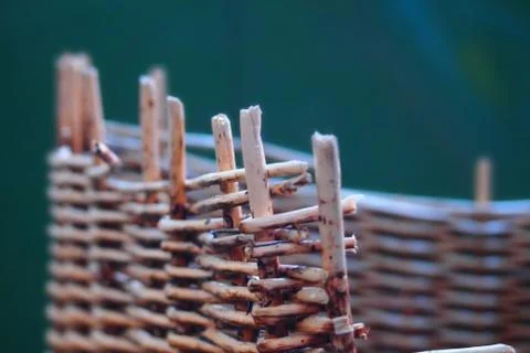 Rustic basket weave in front of blue green background Stock-Fotos