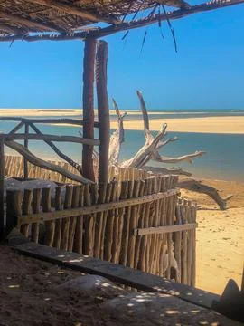 Rustic Beach View Through Wooden Hut Stock Photos