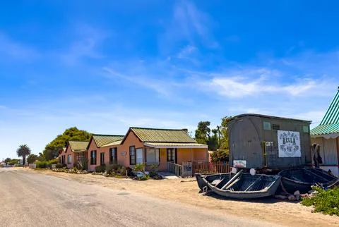 Rustic beachfront bed and breakfast accommodations in small coastal town Stock Photos