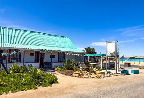 Rustic beachfront bed and breakfast accommodations in small coastal town Stock Photos