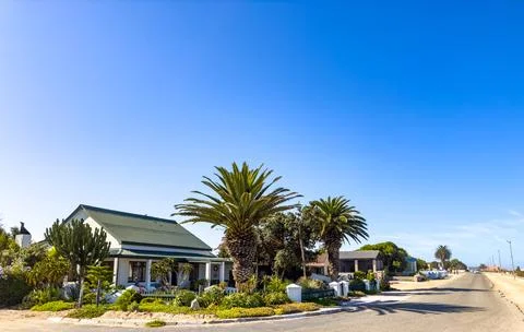 Rustic beachfront bed and breakfast accommodations in small coastal town Stock Photos