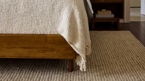 Rustic Bed Corner with Beige Linen Blanket on Wooden Bed Frame Stock Footage 340402080