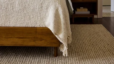 Rustic Bed Corner with Beige Linen Blanket on Wooden Bed Frame Stock Footage 340402124