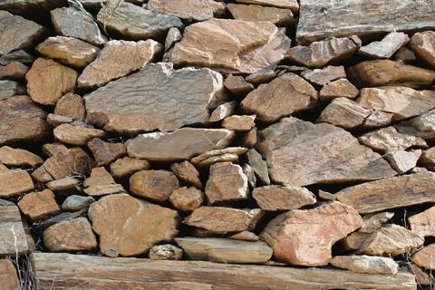 Rustic beige limestone Stock Photos