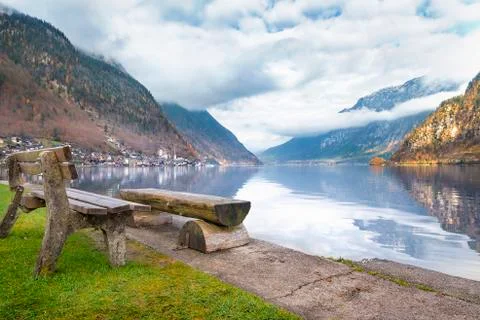Rustic benches on lakeshore Stock Photos