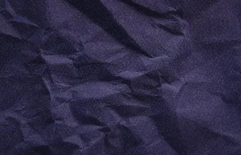 Rustic blue crumpled paper texture making a perfect background 写真素材