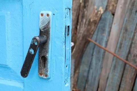 This Rustic Blue Door Handle has a unique weathered texture that enhances its Photos