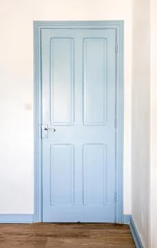 Rustic blue door in a house Stock Photos