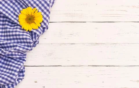 Rustic blue table cloth and blossom on white wood background Stock Photos