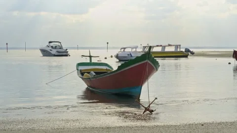 Rustic boat on Ilha do Mel, Brazil, low tide, calm water, cloudy day 스톡 동영상 336454922