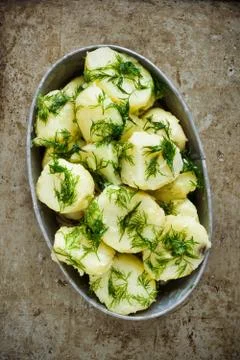 Rustic boiled potato and dill Stock Photos
