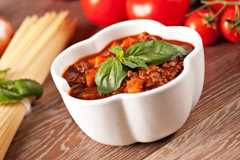 Rustic bolognese meat sauce. Typical Italian dish. Stock Photos