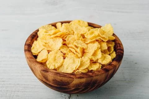 Rustic bowl of corn flakes Stock Photos