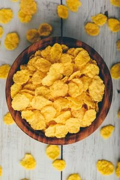 Rustic bowl of corn flakes Stock Photos