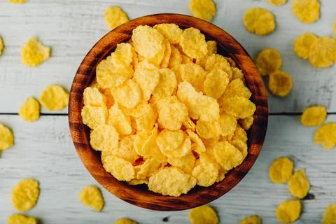 Rustic bowl of cornflakes Stock Photos