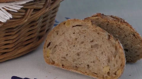 Rustic bread in the bakery basket with napkin Video stock 56718608