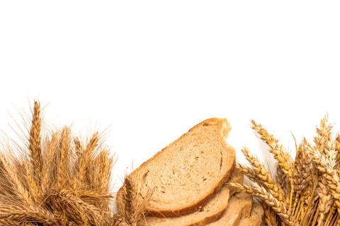 Rustic bread. Fresh loaf of rustic traditional bread with wheat grain ear or  Stock Photos
