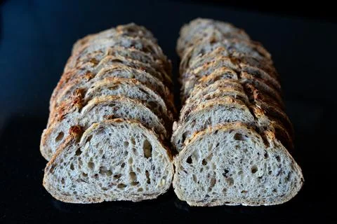 Rustic Bread Loaves on Dark Background Stock Photos