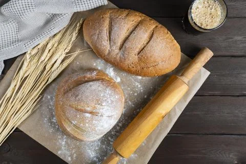 Rustic Bread Loaves with Wheat and Rolling Pin Stock Photos
