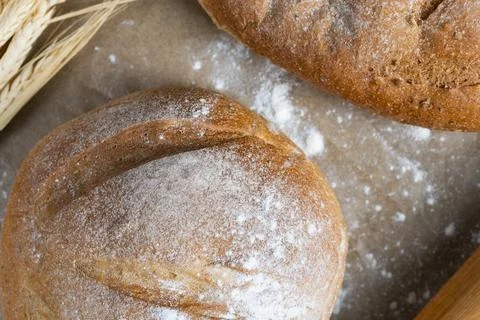 Rustic Bread Loaves with Wheat and Rolling Pin Stock Photos