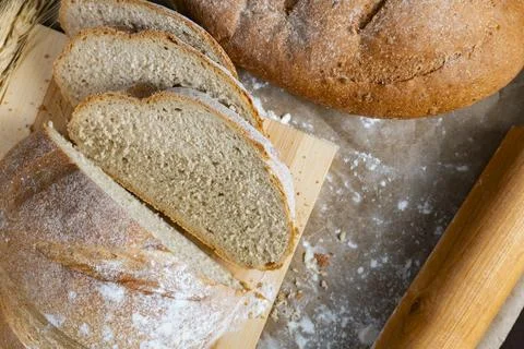 Rustic Bread Loaves with Wheat and Rolling Pin Stock Photos