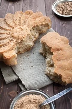 Rustic bread with sesame seeds Stock Photos
