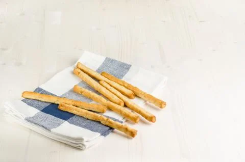 Rustic breadsticks  on wood table, close up, background Stock Photos