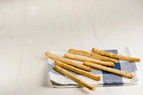 Rustic breadsticks  on wood table, close up, background Stock Photos