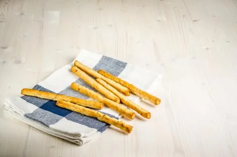 Rustic breadsticks  on wood table, close up, background.. Stock Photos